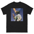Black t-shirt with a graphic of a person holding a flaming object against a blue sky.