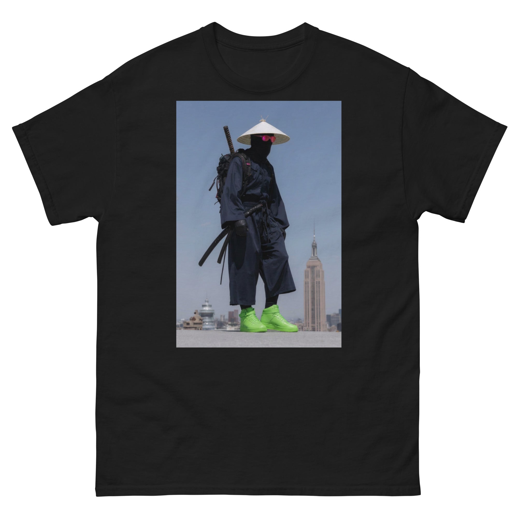 Black t-shirt with a graphic of a person in traditional attire with modern cityscape background